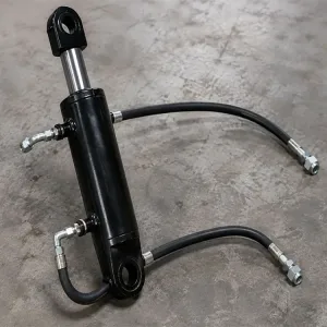 XCMG GR2605 motor grader hydraulic cylinder and hose assembly displayed for leakage inspection and maintenance.
